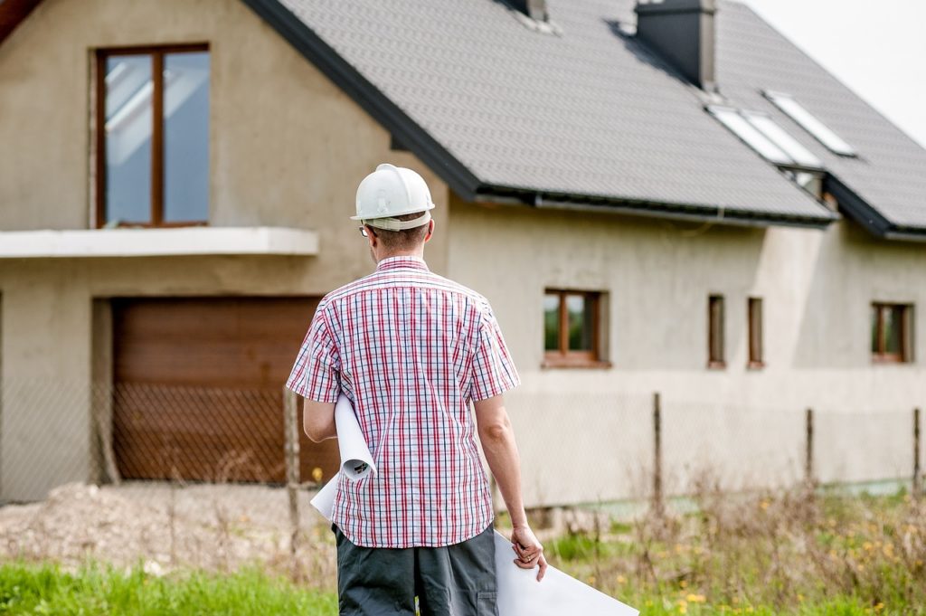 contractor going towards a house