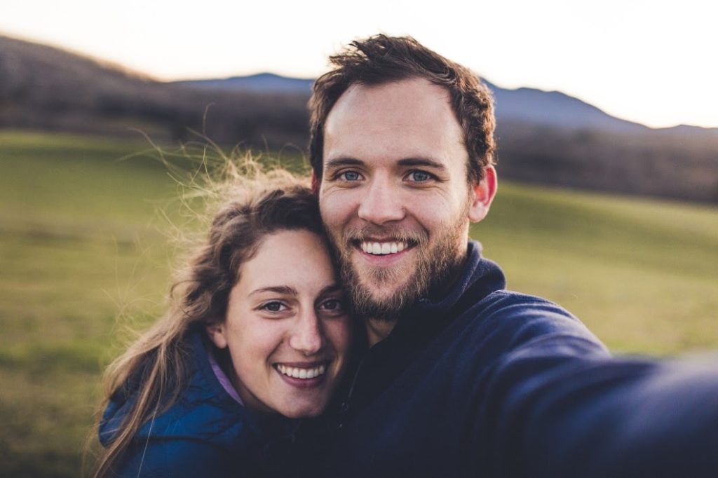 a couple taking a selfie