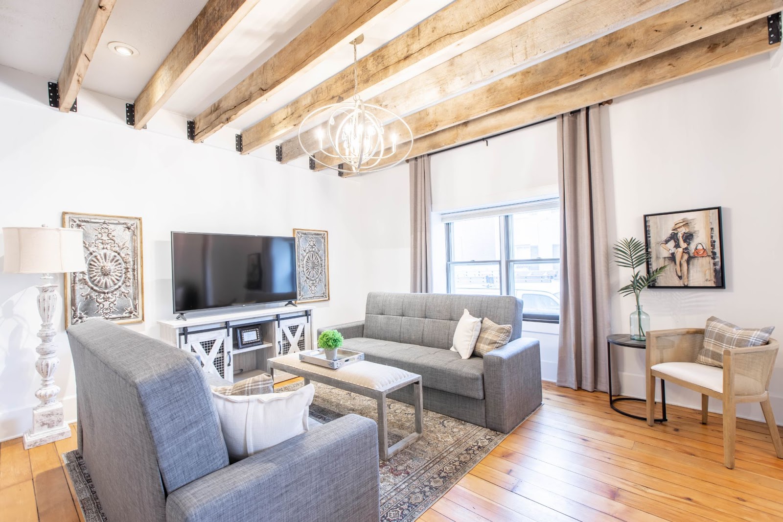 Dark Living Room Ceiling With White Beams