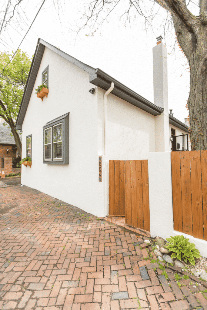 Brick patio next to a house.