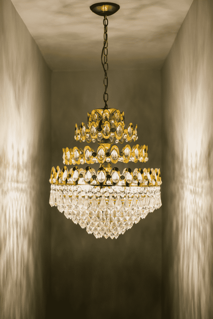 A large crystal and gold chandelier. 