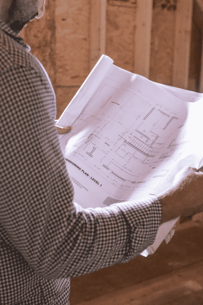 man holding a site plan