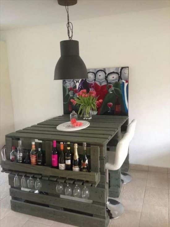 Pallet wine rack with attached table.